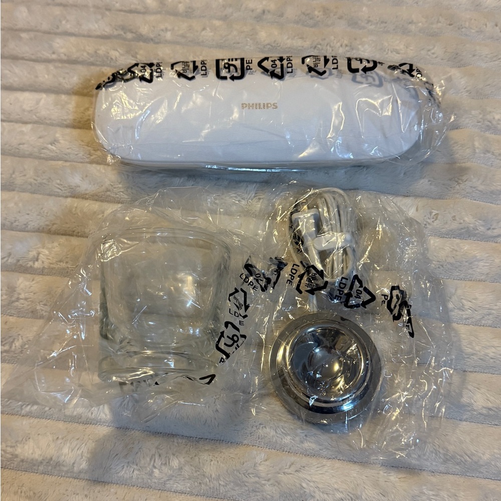 Philips White and Silver Charger